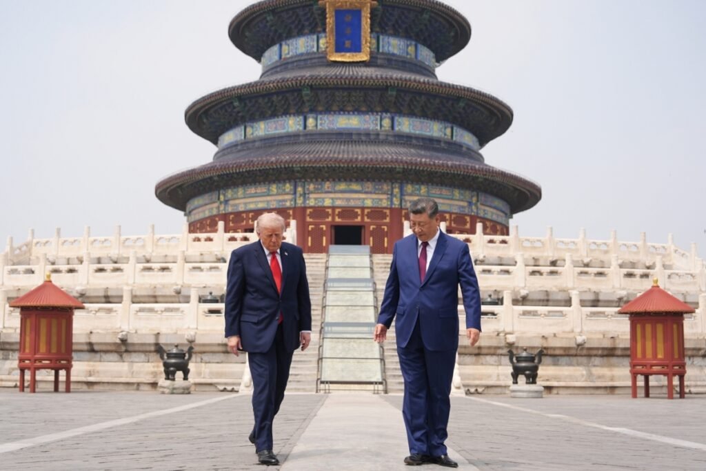 US President Donald Trump and Chinese President Xi Jinping walk side-by-side during a formal visit to the Temple of Heaven in Beijing, providing a precise historical backdrop for an analysis of the Trump-Xi summit.