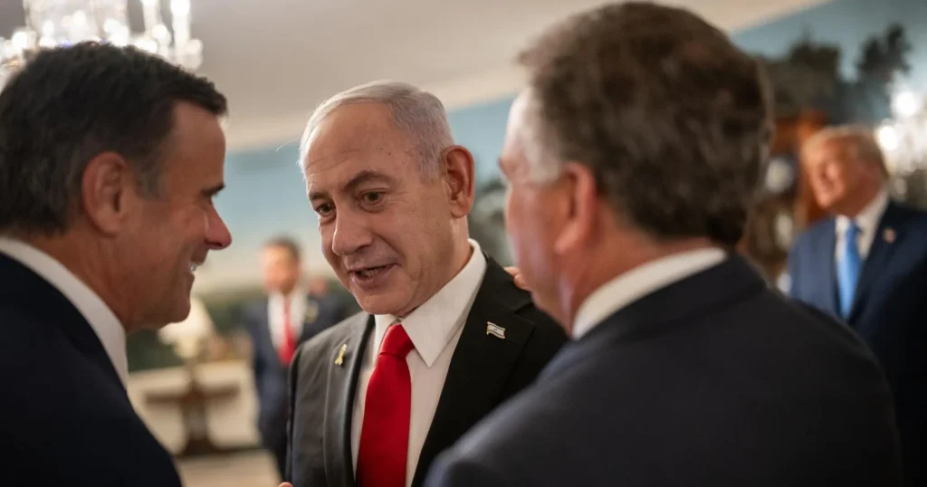 لا شيء أكثر خطورة من نتنياهو الغاضب Israeli Prime Minister Benjamin Netanyahu talking closely with diplomats in a crowded room, providing a stark visual backdrop to the strategic analysis of a Netanyahu scorned.