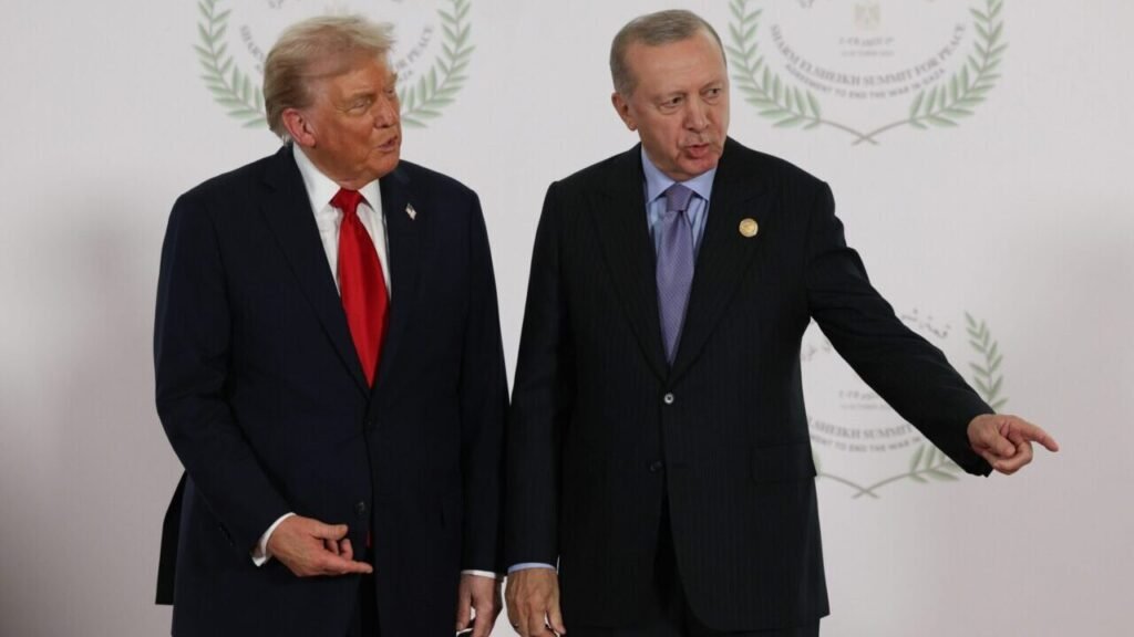 Turkish President Recep Tayyip Erdogan gestures while speaking with U.S. President Donald Trump in front of an official summit backdrop, illustrating the shifting alliances and diplomatic strategies driving Turkey’s Regional Reset.