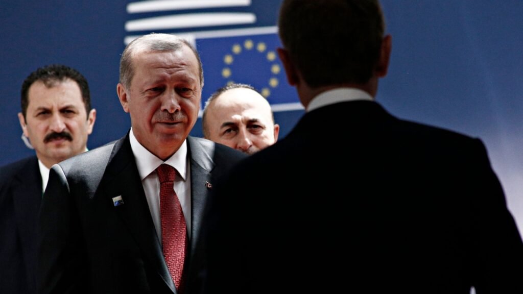 Turkish President Recep Tayyip Erdoğan in formal diplomatic engagement with European Union officials, symbolizing Turkey security partnership Europe negotiations at an EU summit meeting.