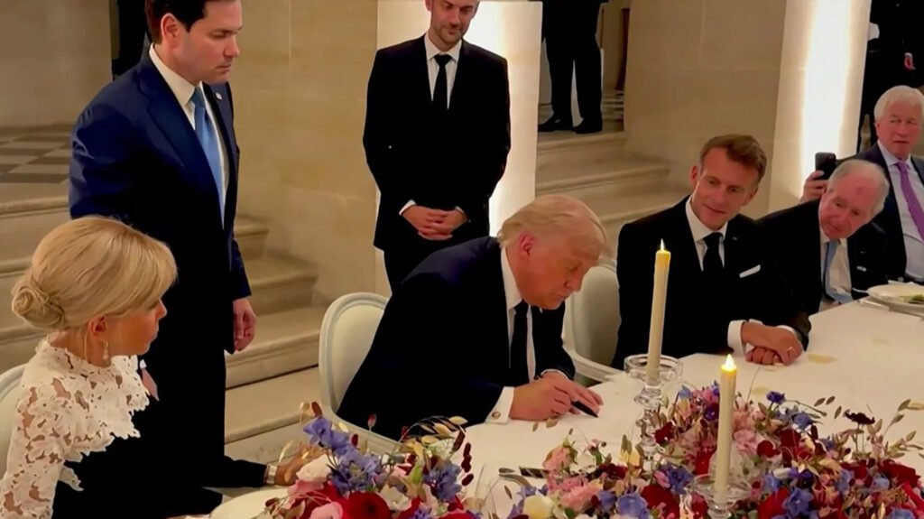 US President Donald Trump seated at a formal dinner table signing the memorandum of understanding with Iran, watched closely by French President Emmanuel Macron and Marco Rubio, capturing the diplomatic milestone setting off Major Regional Transformations.