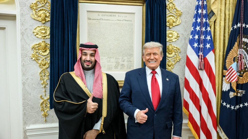 Donald Trump and Saudi Crown Prince Mohammed bin Salman standing together giving thumbs-up gestures in the Oval Office, highlighting ongoing diplomatic discussions and agreements related to Saudi Nuclear.