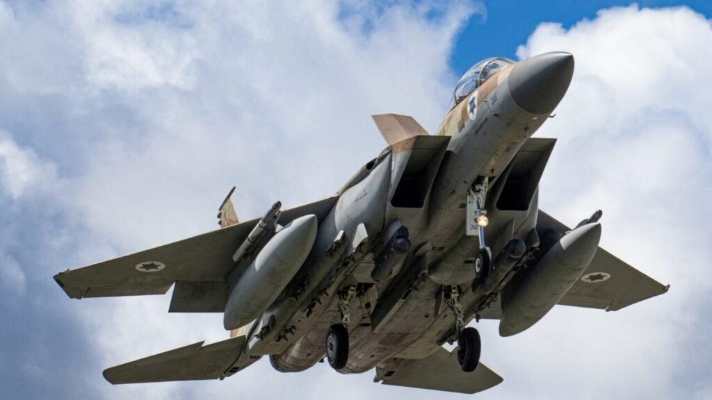 The Price of Regional Power in the Middle East An Israel Defense Forces (IDF) F-15 fighter jet in flight during the Iniochos multinational military exercise, illustrating Israel's active projection of its military capabilities as a regional power.
