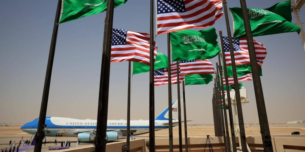 Air Force One parked at King Khalid International Airport with U.S. and Saudi flags flying, highlighting the strategic diplomatic ties built on the US-Saudi partnership.