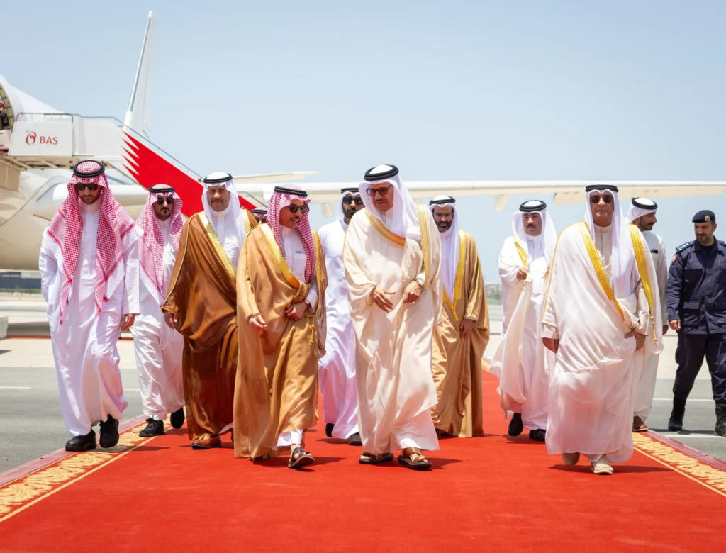 GCC economic integration drives long-term Gulf growth Gulf leaders in traditional thobes and headscarves walking along a red carpet on an airport tarmac near an aircraft, illustrating regional partnerships advancing GCC economic integration.