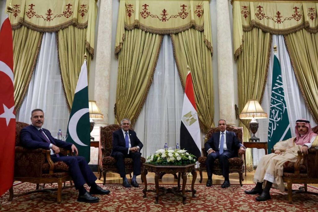 Gulf Security Initiative Tests the U.S.-Israel-Iran Order Turkish Foreign Minister Hakan Fidan, Pakistani Foreign Minister Mohammad Ishaq Dar, Egyptian Foreign Minister Badr Abdelatty, and Saudi Foreign Minister Prince Faisal bin Farhan Al Saud seated together during a formal diplomatic meeting with national flags, illustrating multilateral cooperation relevant to the Gulf Security Initiative.
