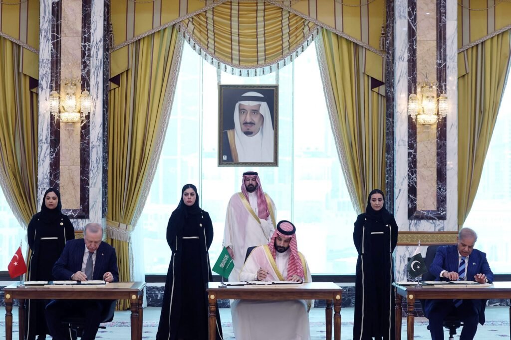 Turkish President Erdogan, Saudi Crown Prince Mohammed bin Salman, and Pakistani Prime Minister Sharif sign a trilateral defense agreement in Mecca, highlighting regional strategic shifts away from the traditional US-Led Order.