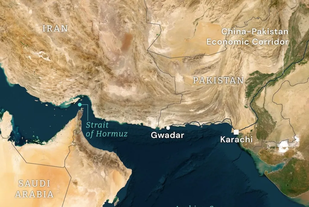 تأمين مخاطر الحرب يعيق أسواق الشحن في هرمز A satellite map of the Middle East and South Asia showing the strategic Strait of Hormuz between Iran and the Arabian Peninsula, alongside Pakistan's Gwadar and Karachi ports and the China-Pakistan Economic Corridor, visually illustrating the geographic chokepoint where surging War-risk insurance premiums are strangling commercial shipping flows in the Hormuz market.