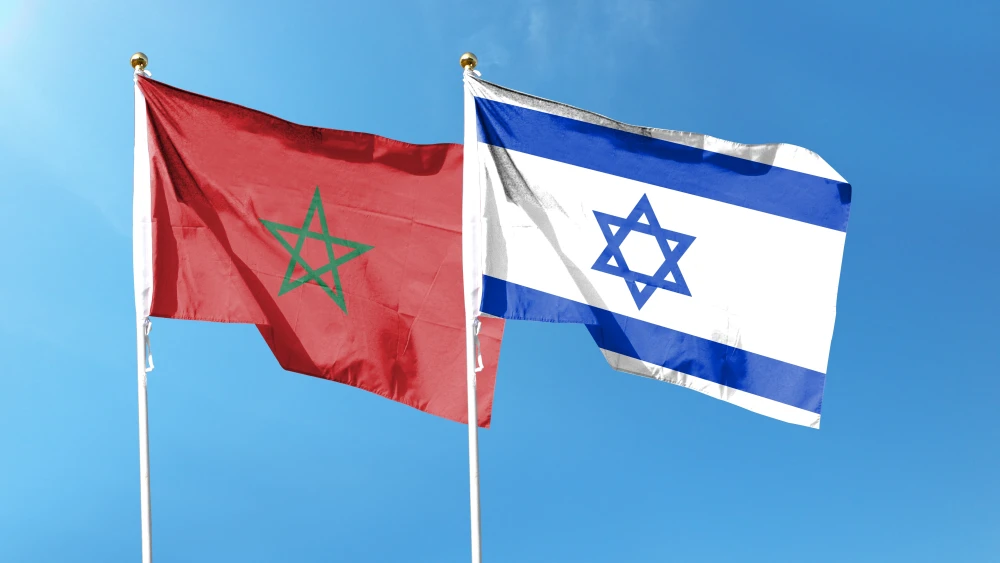 Morocco normalization with Israel reshapes North Africa Morocco's red flag with its green pentagram and Israel's blue-and-white flag with the Star of David fly side by side on tall poles against a clear blue sky, capturing the diplomatic shift known as Morocco normalization that is reshaping North Africa.