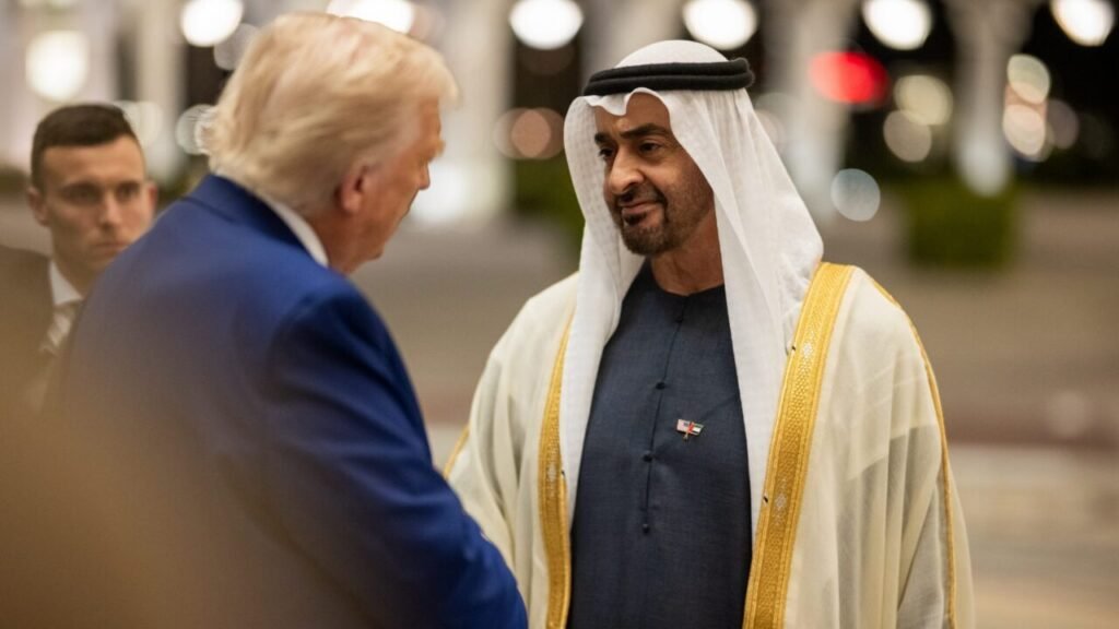 دفاع الصواريخ في الخليج يوقف الصواريخ، لكنه لا يمنع الإكراه الإيراني President Donald Trump, seen from behind in a blue suit, is greeted by UAE President Sheikh Mohamed bin Zayed Al Nahyan in traditional white robes and headdress during an official reception in Abu Dhabi, a meeting that underscores the limits of Gulf Missile Defense against Iranian coercion.