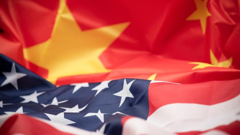 American flag draped over the Chinese national flag representing diplomatic ties in Trump-Xi Talks.