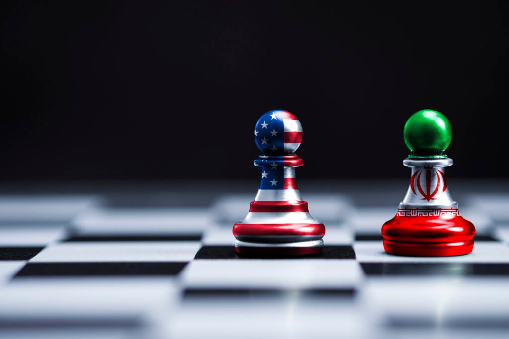 US and Iranian flag chess pawns on a chessboard representing Operation Epic Fury.