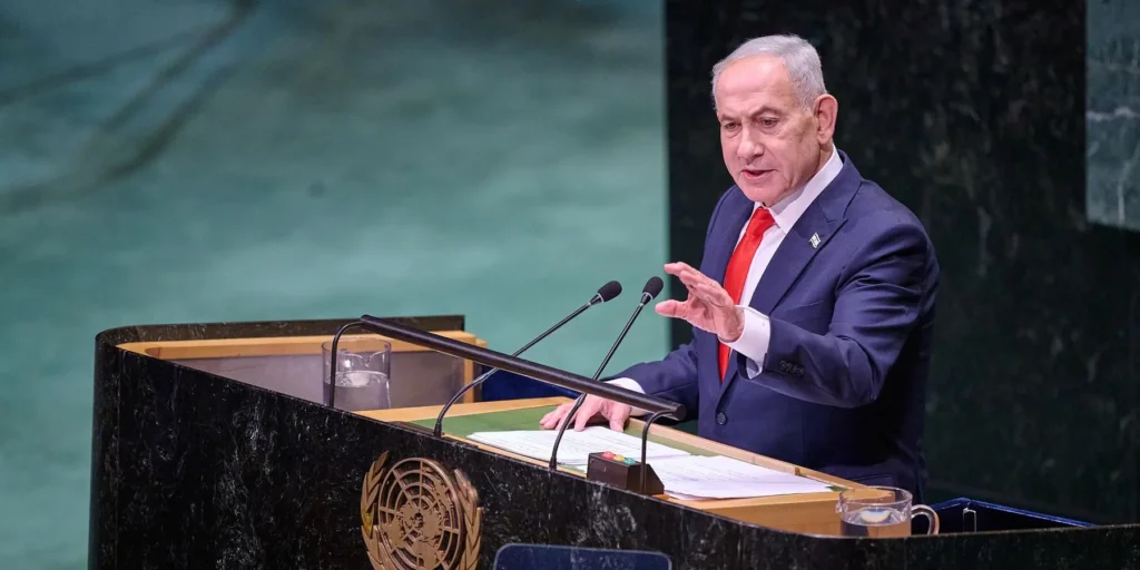 Netanyahu Warnings: What He Knew Before Oct. 7 Israeli PM Benjamin Netanyahu gestures while speaking at the UN podium, reflecting the Netanyahu warnings before Oct. 7.