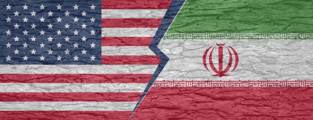 محدودیتهای خشم حماسی: آیا تحریمها میتوانند کار را در ایران تمام کنند؟ United States and Iranian flags split across a cracked wooden texture background, symbolizing geopolitical confrontation and economic pressure under the Limits of Epic Fury strategy.