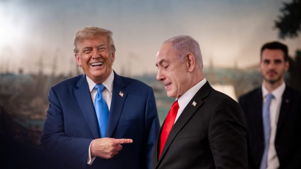 Post-Election Strikes on Iran Would Bring Damage, Not Surrender Donald Trump laughing and pointing towards Israeli Prime Minister Benjamin Netanyahu during a meeting, illustrating political discussions on foreign policy and potential Strikes on Iran.