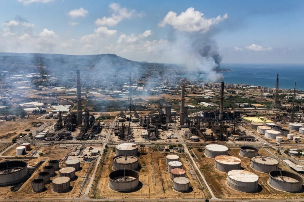 Aerial view of the industrial Baniyas refinery complex and oil storage tanks on Syria’s Mediterranean coast, illustrating strategic energy alternatives via the Kirkuk-Baniyas Pipeline.