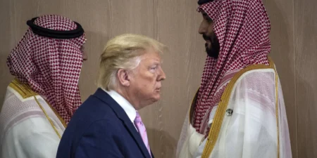Donald Trump standing face-to-face with Saudi Crown Prince Mohammed bin Salman during bilateral discussions on nuclear cooperation and the geopolitics of Saudi Uranium Enrichment.