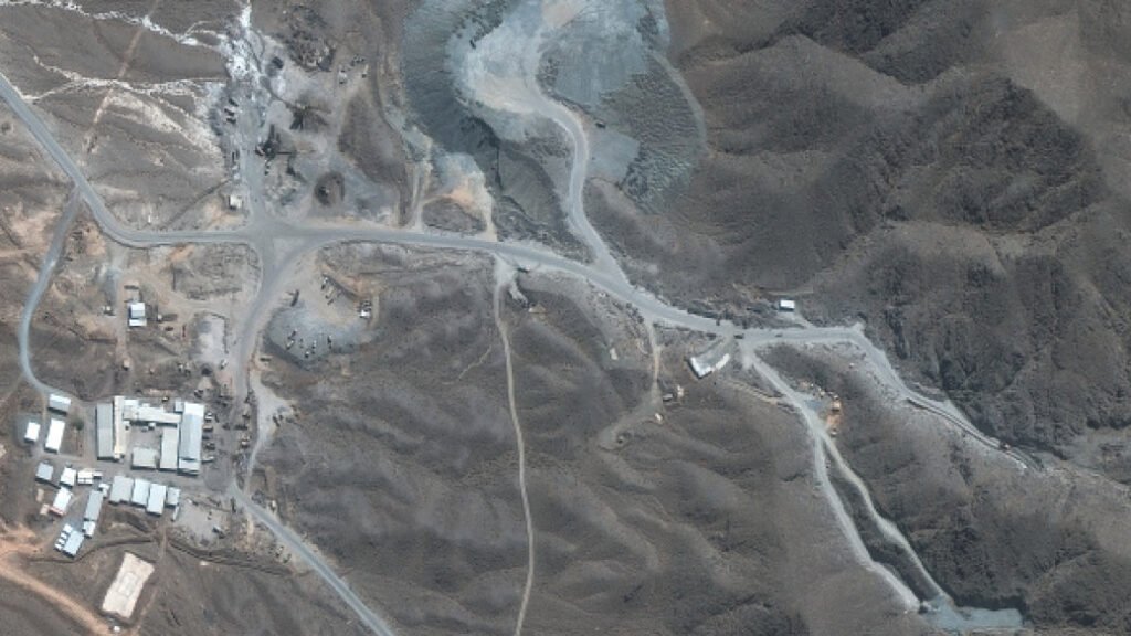 A satellite view of a deeply buried underground nuclear facility and mountain complex in Iran, highlighting strategic limitations surrounding the potential deployment of the Mother of All Bombs.