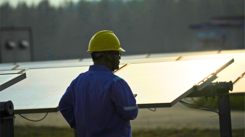A technician inspecting solar panels at a photovoltaic power station in Beijing, demonstrating how domestic Chinese Technology self-reliance impacts European firms.