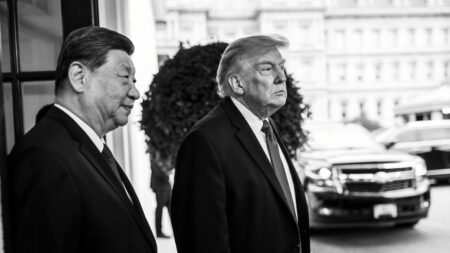 Chinese President Xi Jinping and U.S. President Donald Trump standing together, symbolizing the complex strategic landscape of US-China Relations.