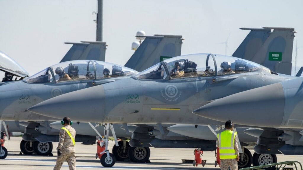 Saudi fighter jets and ground crew preparing on a tarmac, illustrating the air power advantage that leaves Riyadh without a winning move in the Saudi-Houthi Conflict.