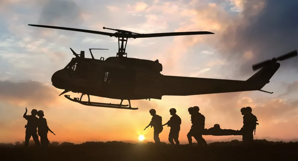 Silhouette of soldiers evacuating a casualty to a military helicopter, illustrating the heavy human and financial costs of maintaining American Dominance.