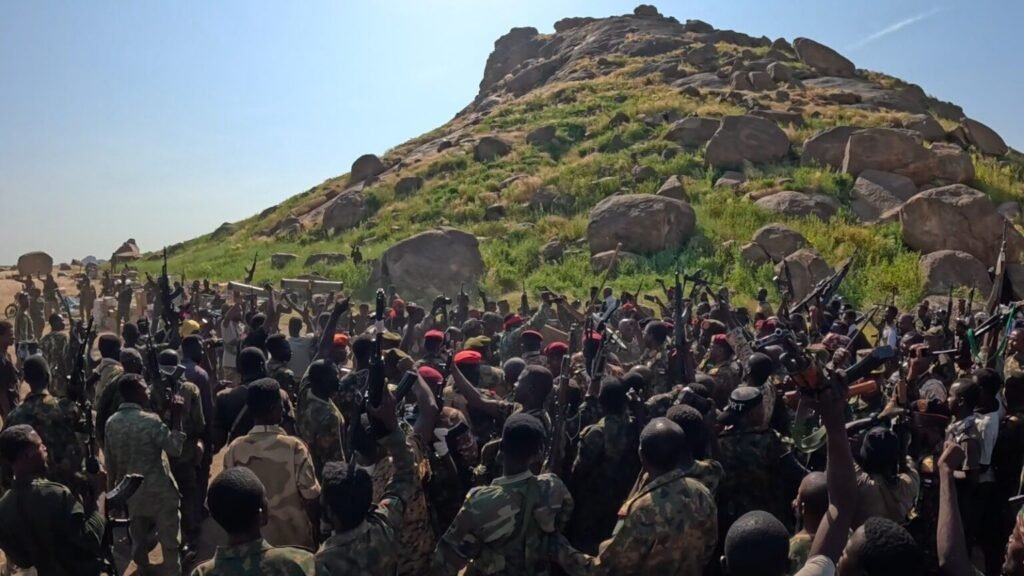 Muslim Brotherhood tests Boulos peace deals in Sudan and Libya Sudanese Armed Forces soldiers raising their weapons and celebrating at Jebal Moya after capturing territory from the Rapid Support Forces, illustrating political challenges involving the Muslim Brotherhood in US-backed peace negotiations.